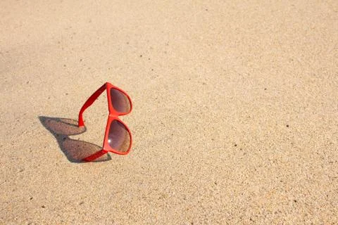 Red sunglasses on the beach Stock Photos