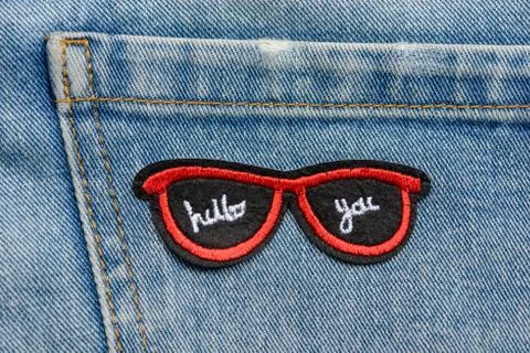 Red sunglasses embroidered patch 写真素材