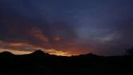 Red Sunrise Over Desert Landscape Stock Footage