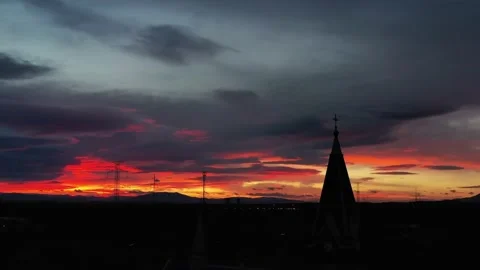 Red sunrise over the Tatra Mountains with the church in the background. Stock Footage 238671990