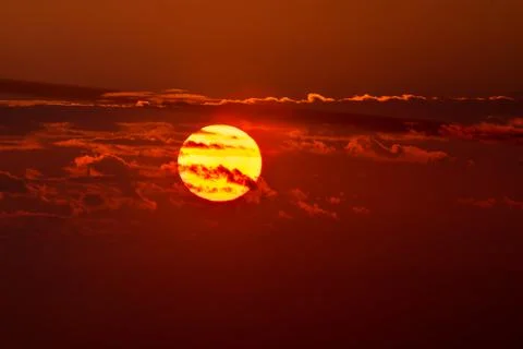 Red sunrise sky with clouds Stock Photos