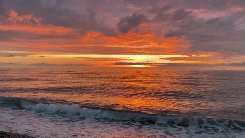 Red sunset on beach, sea view with waves 스톡 동영상 218439934