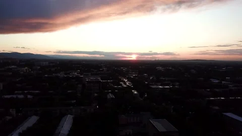 Red sunset with clouds over the city of Almaty. Video stock 143695984