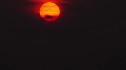 Red sunset in dark cloudy sky Stock Footage 267535584