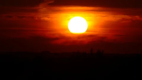 Red sunset during scorching hot summer h... | Stock Video | Pond5