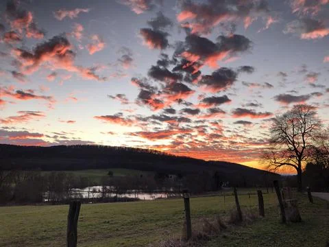Red sunset in the mountains Stock Photos