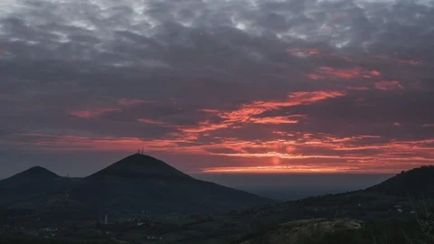 Red sunset in the mountains timelapse Stock Footage