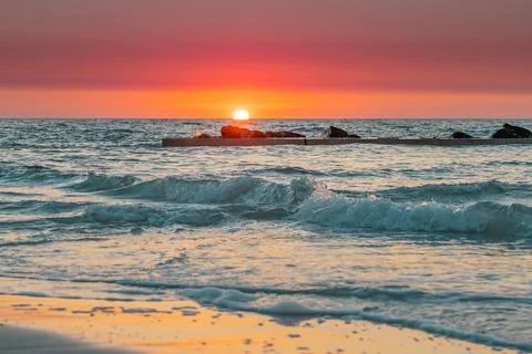 Red Sunset. Ocean Beach. Bright sea sunset Stock Photos