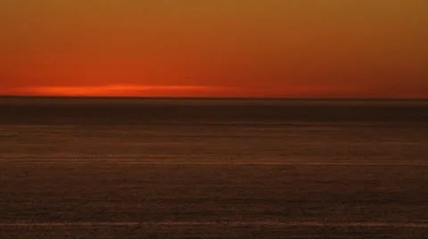 Red Sunset Over Beach Stock Footage 12047419