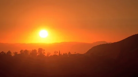 Red sunset over countryside Stock Footage 82830224