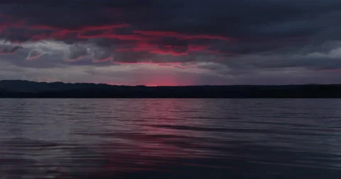 RED SUNSET OVER LAKE Stock Footage 230996719