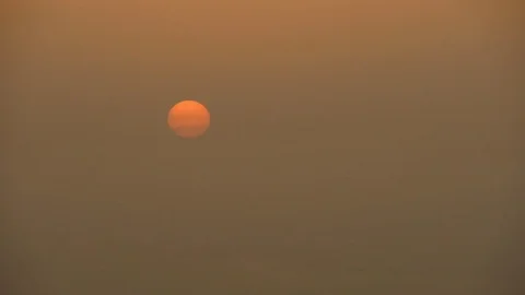 Red Sunset over a polluted, smog filled landscape Stock Footage 104525192