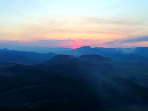 Red Sunset over Rolling Hills Aerial Shot Stock Footage 79171889
