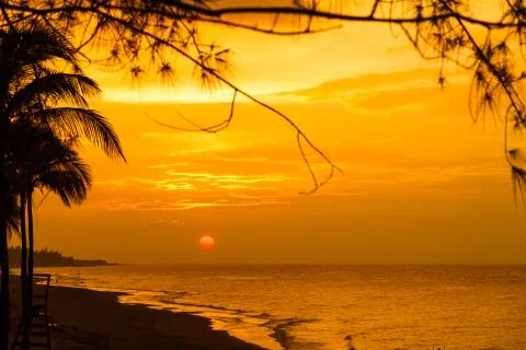 Red sunset over sea with clouds, Caribbean sea, Cuba Stock Photos