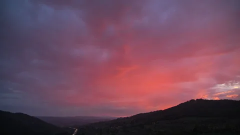 Red sunset reflected in the cloud Timelapse 6k Stock Footage 140026384