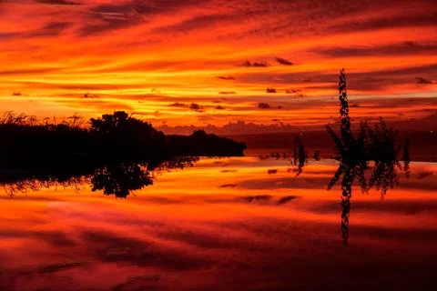 Red sunset reflection Stock Photos