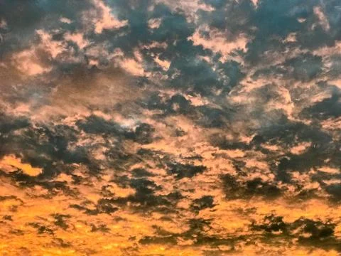 Red sunset sky with clouds at evening Stock Photos