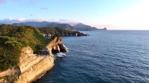 Red Sunset Sky over Cape Irozaki | Magic Hour Drone Aerial Stock Photos