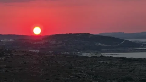 Red sunset sky, sun goes down. Malta Stock Footage 280750595