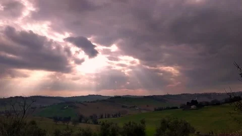 Red sunset sky time lapse with countryside landscape. sun and cloud timelapse. Stockbeeldmateriaal 233902364