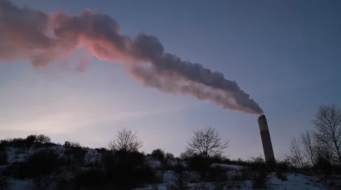 Red sunset Smoke from chimney stack against sky Stock Footage 59096644