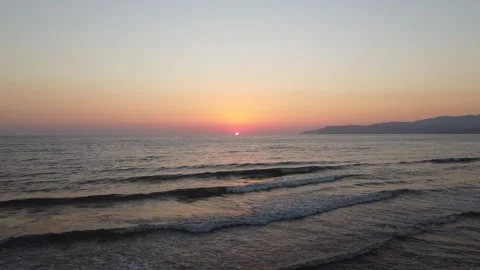 Red sunsets over sea.Red sky, yellow sun and amazing sea. Stock Footage 219614089