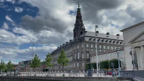 Red Super car driving in front of Copenhagen landmark Video stock 158994532