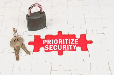 On the red surface there is a lock with a sticker with the inscription - Prio Stock Photos