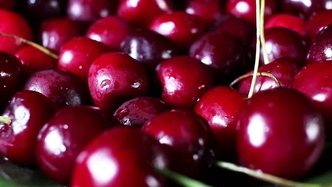 Red sweet cherry background rotating food texture closeup video footage. Studio Video stock 91042060