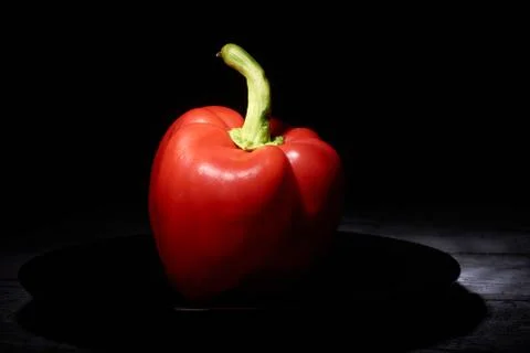 Red sweet pepper on a black background Stock Photos