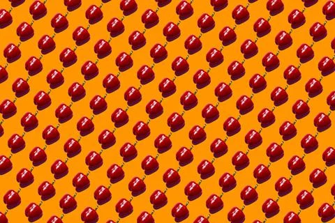 Red sweet pepper pattern on orange background pop art design Stock Photos