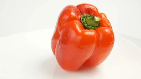 Red sweet pepper on white background, bellpeppers, paprika, rotation Video stock 148391464