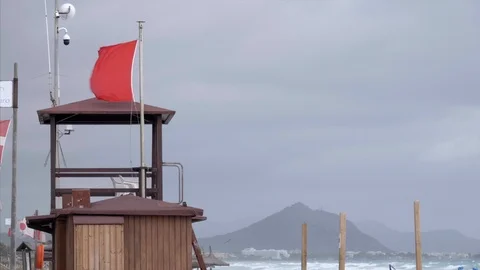 Red swim flag Stock Footage 98571386