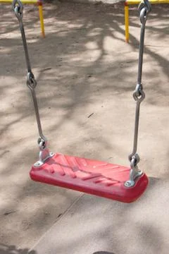 Red swing Stock Photos