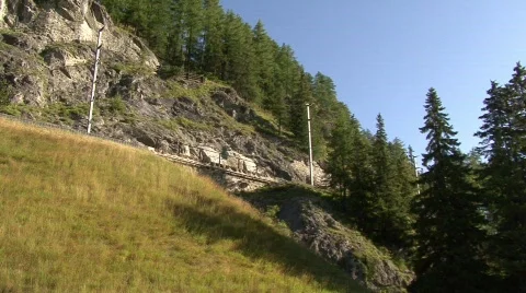 Red Swiss Train Passing By Stock Footage 500466