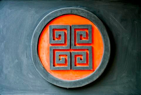 Red symbol on the wall Stock Photos