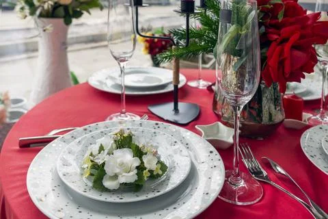 Red Table setting for a wedding or dinner event, with flowers Stock Photos