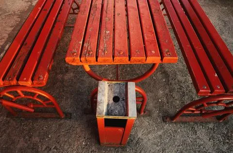 Red Table, Two Benches and Ashtray Stock Photos
