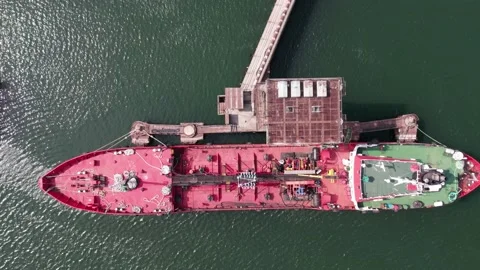 Red tanker ship loading and unloading oil and gas Stock Footage 201992537