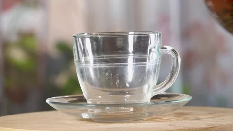 Red tea is poured into the mug Stock-Footage 112391938