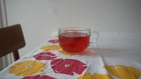 Red tea on a table Stock Footage 267841400