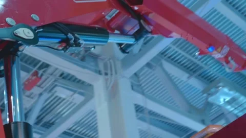 Red telescopic boom with a powerful hydraulic cylinder on a truck crane  Stockbeeldmateriaal 333321776