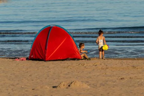 Red tent on the beach Foto stock