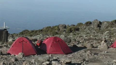 Red tents at base camp Stock Footage 682409