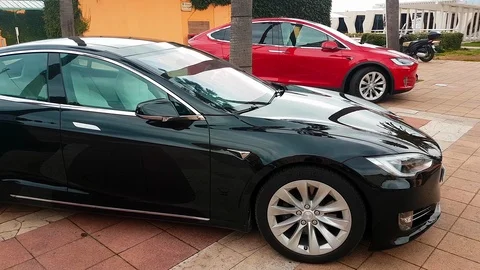 Red Tesla Model S And Black SUV Tesla Model X Video stock 86700456