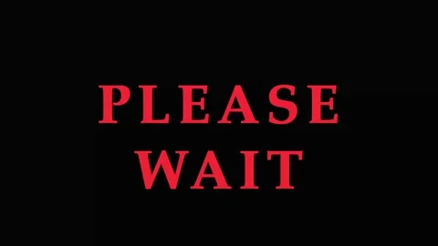 Red text 'Please Wait' on black screen with subtle motion and cinematic eff.. Video stock 343415771