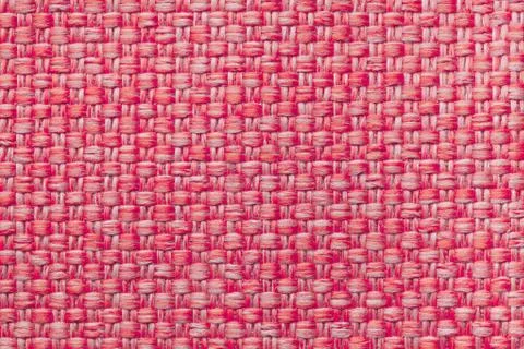 Red textile background with checkered pattern, closeup. Structure of the fabr Stock Photos