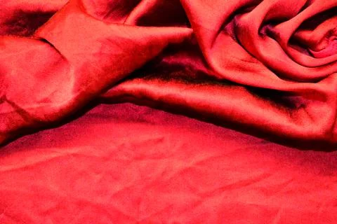 Red textile pattern as a background. Red material texture on fabric Stock Photos