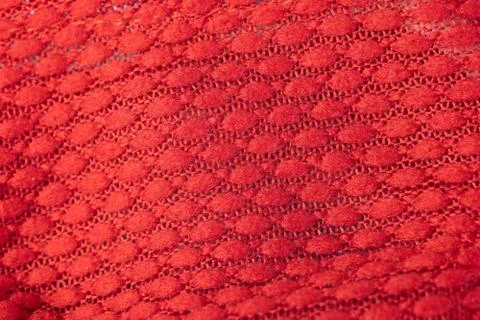 Red texture pattern background with relief. Textured surface Stock-Fotos