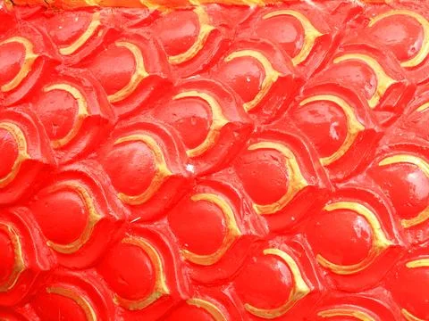 Red texture of serpent statue. Stock Photos